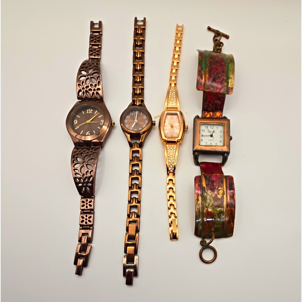 Lot of 4 Womens Assorted Watches.Bronze, Goldtone, Bracelet Bands New Batteries.
